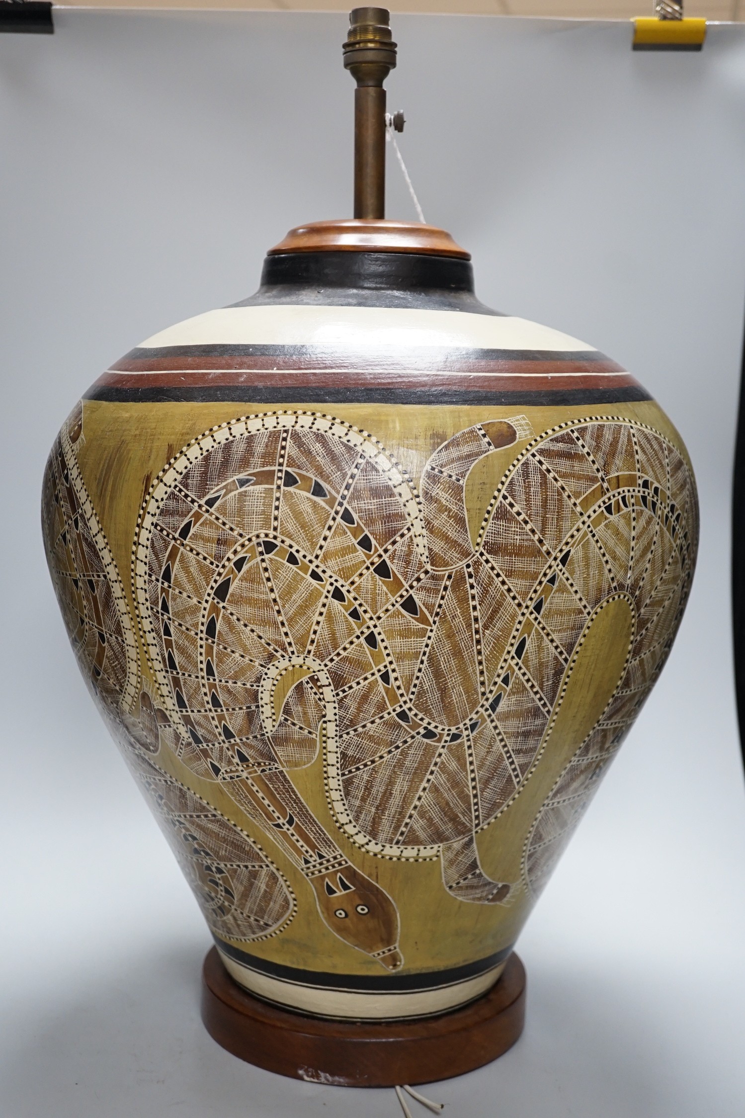 An Australian Aboriginal style painted pottery large lamp, 61cm total height
